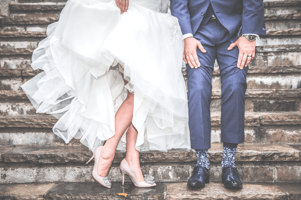 bride and groom showing ankles